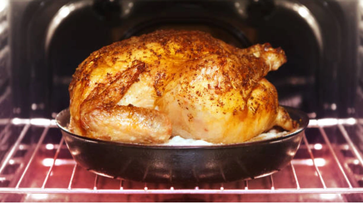 A plate of leftover rotisserie chicken, featuring tender, golden-brown pieces of chicken, ready to be repurposed into a variety of delicious meals.