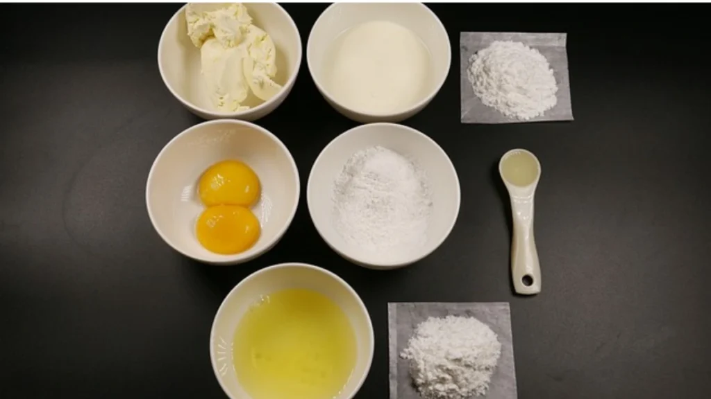 Flat lay of essential baking ingredients for making Gipfeli, arranged with precision for a recipe.